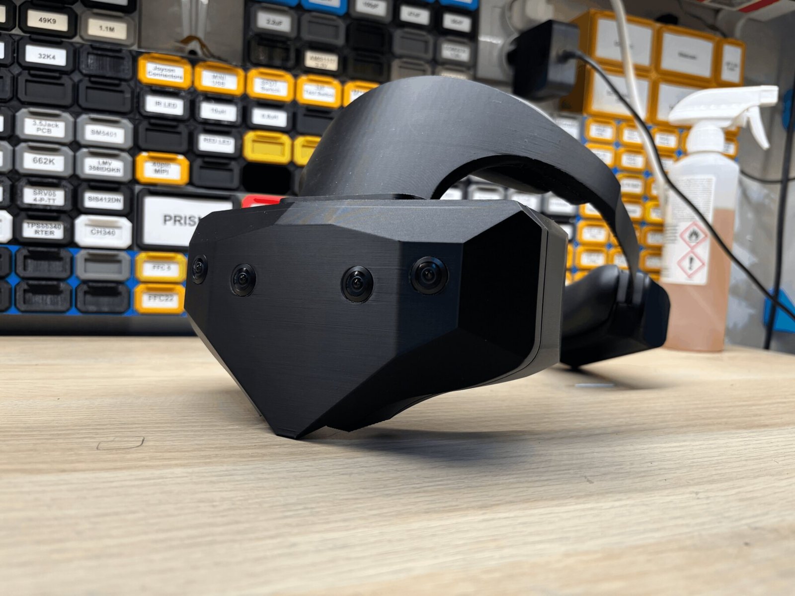 The Vector Gear V2 on the bench, four front-facing cameras across the faceplate.